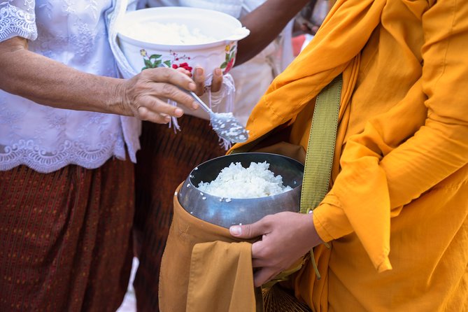 Morning Buddhist Almsgiving, Grand Palace and Flower Market Tour in Bangkok - Marble Temple and the limits of the ceremony