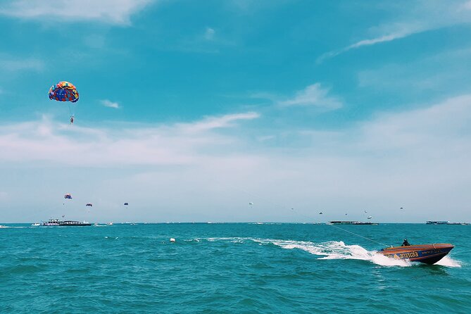 Pattaya: Parasailing Experience - Getting fitted with the parachute and harness