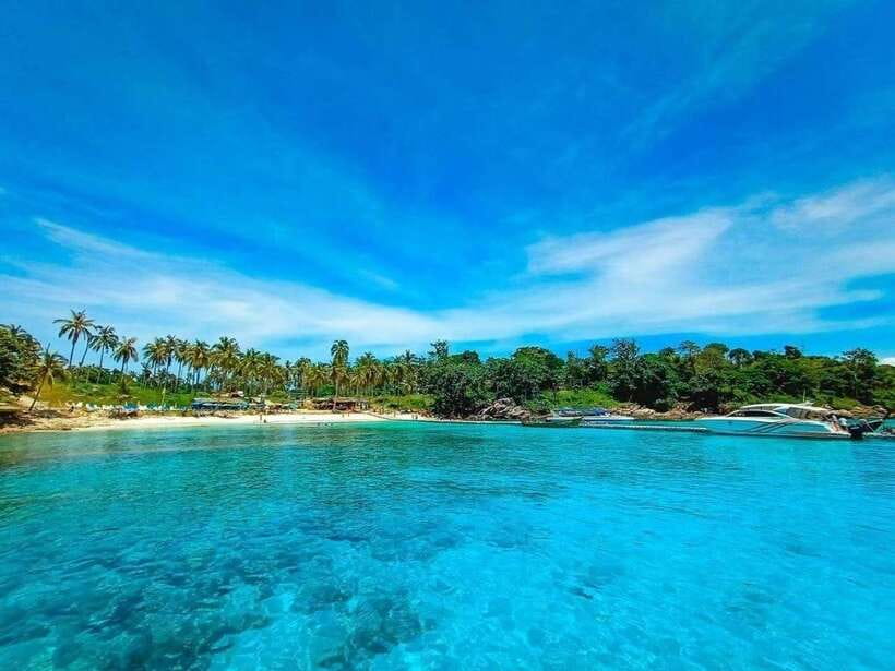 Phuket: Coral Yacht Boat Tour to Coral Island with Sunset - Pirates Beach: a pretty first stop
