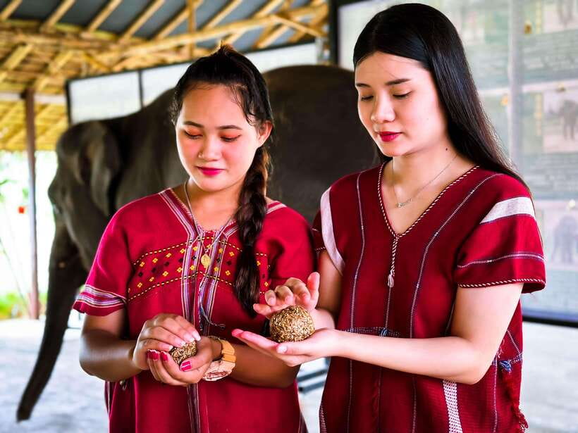 Phuket : Experience feeding and bathing elephants 1.5 Hrs. - Changing into a mahout shirt