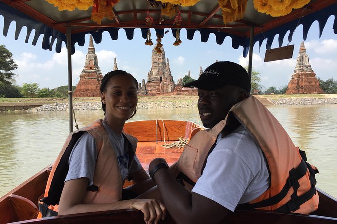 Private Excursion to Ayutthaya, UNESCO World Heritage site with Boat Tour - Wat Mahathat and the Buddha Head in the Tree
