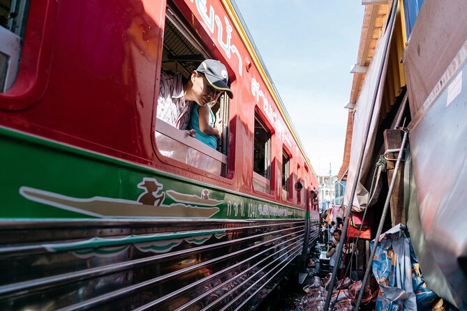 Private Guided Tour to Train Market and Damnoensaduak Floating Market - A railway market built around a train line