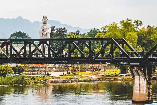 Private Tour: Death Railway, Hellfire Pass and Erawan Waterfall - Walking the Death Railway near the river