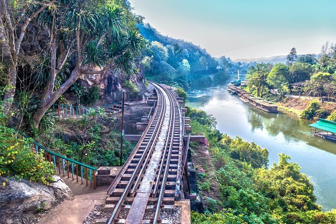 Private Tour: Thai–Burma Death Railway Bridge on the River Kwai from Bangkok - Approaching the River Kwai Bridge by long-tail boat