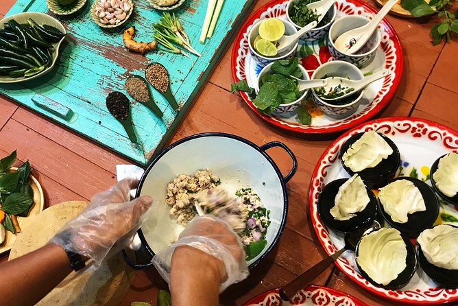 Silom Thai Cooking Experience with Market Visit - Cooking pad thai, tom yum, and Thai curries
