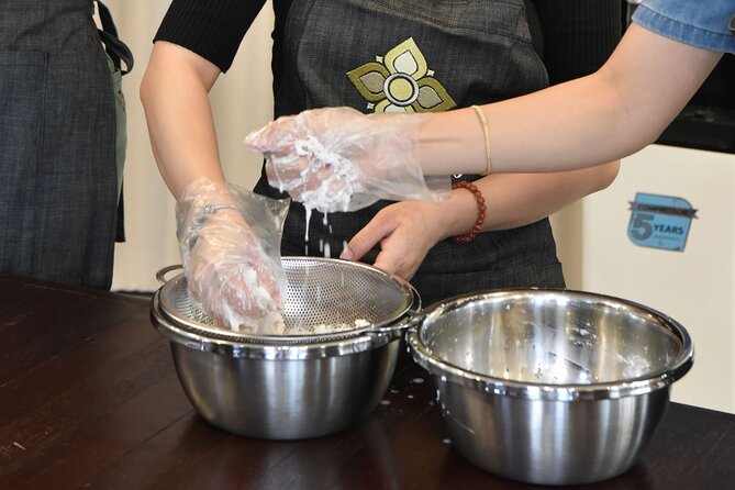 Thai Cooking Class with Market Tour in Sathon Bangkok - Making coconut milk and curry paste by hand