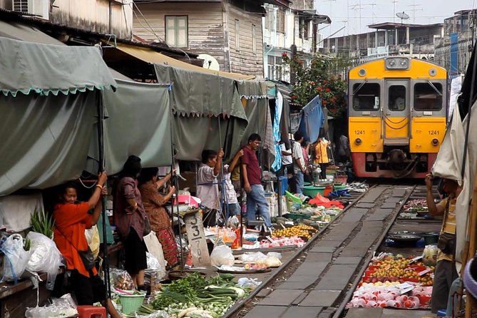 Unique Bangkok Markets: Train Market & Floating Market Adventure - Maeklong Railway Market, where the umbrellas fold
